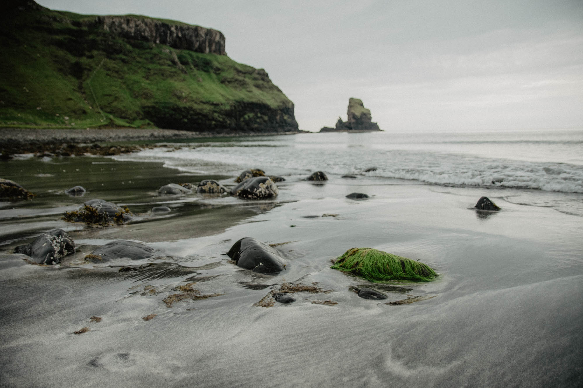 Choose a landscape that you love, like this grey sand beach with natural pools and waterfalls